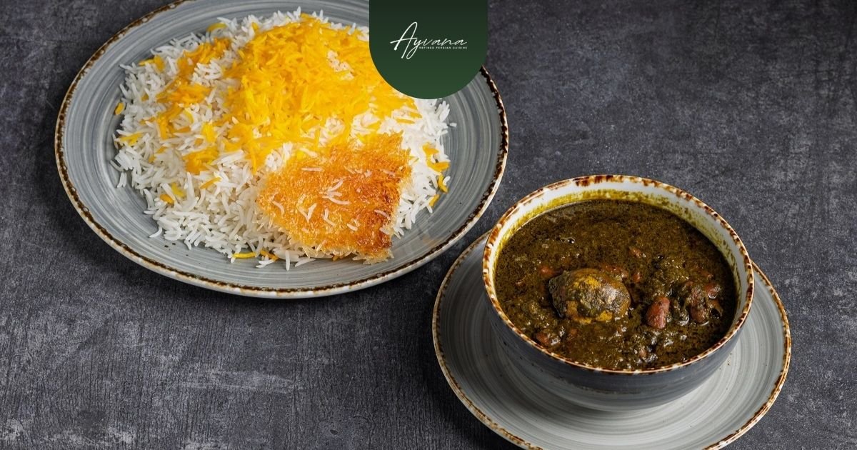 Traditional Ghormeh Sabzi herb stew served beside Persian saffron rice with crispy tahdig on rustic ceramic plates.