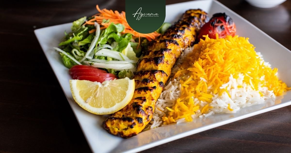 Classic Persian kebab served with golden saffron rice, grilled tomato, fresh herbs and lemon wedge
