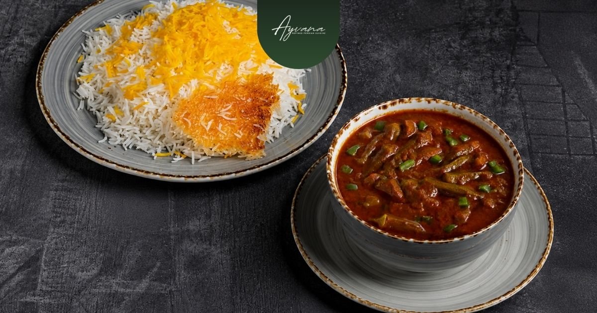 Traditional Khoresh Bamieh okra stew served beside saffron rice with crispy tahdig on rustic ceramic dinnerware.