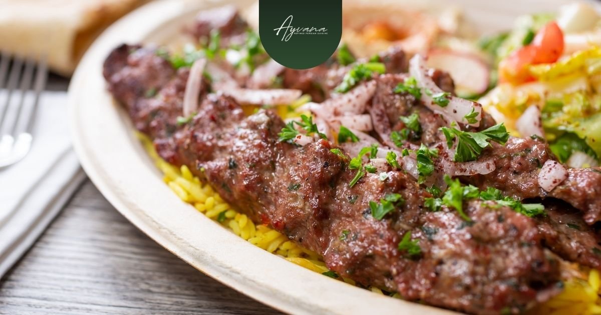 A close-up of chelo kabab koobideh