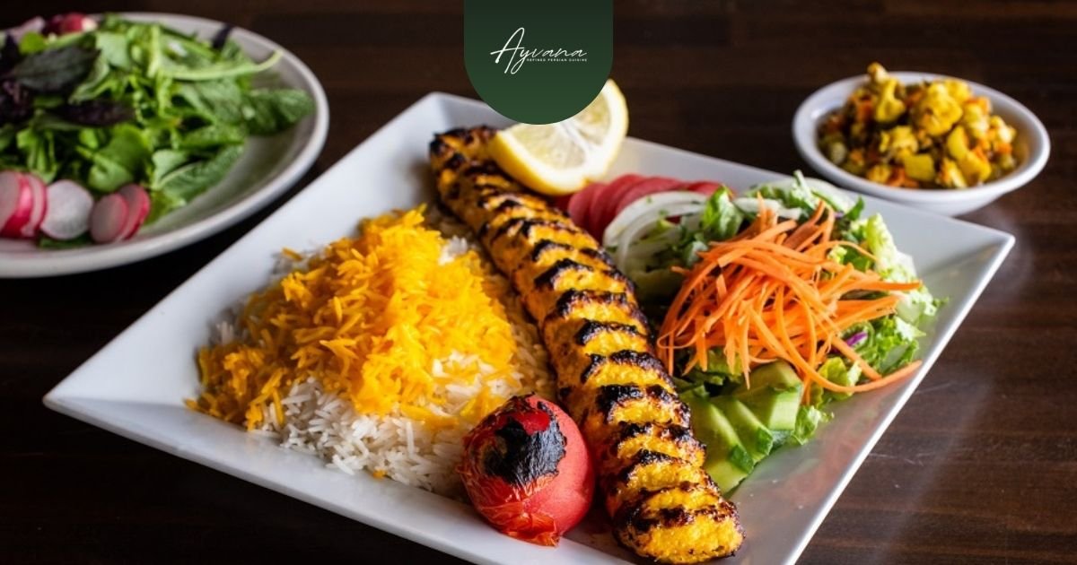Persian dish with grilled kebab, saffron rice, salad, and sides, ideal balanced meal for first-time dining experience